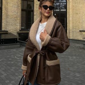 Leather And Fur Korean Style Long Sleeve Splicing Coat Women         (Livraison entre 15 et 21 Jours + Livraison gratuite)
